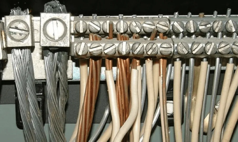 A close up of wiring connections showing aluminum wiring